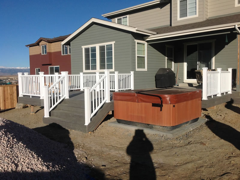 Timbertech Silver Maple with Fortress Residential Iron Panels and Stone Columns