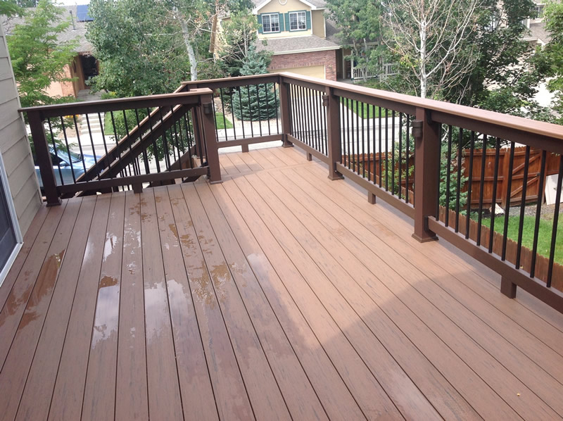 Evolutions Builder Rail with Metal Ballusters and Brown Oak Decking