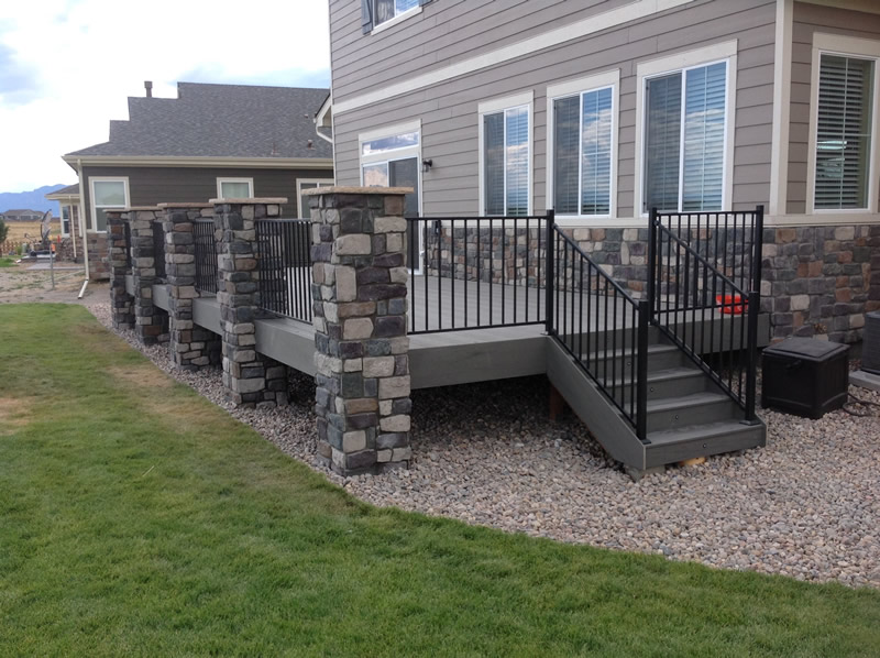 Timbertech Silver Maple with Fortress Black Sand Rail System and Stone Columns