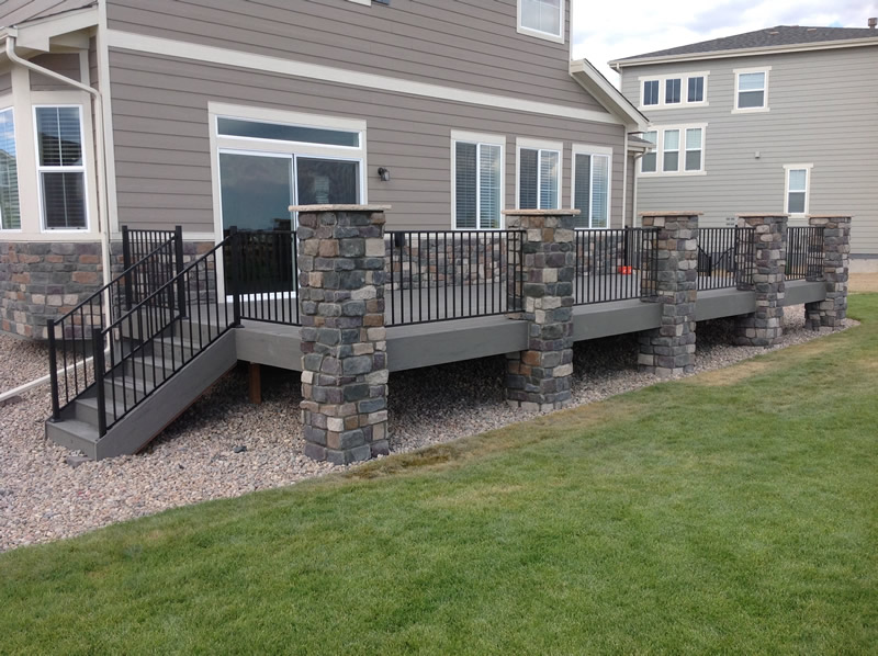 Timbertech Silver Maple with Fortress Black Sand Rail System and Stone Columns